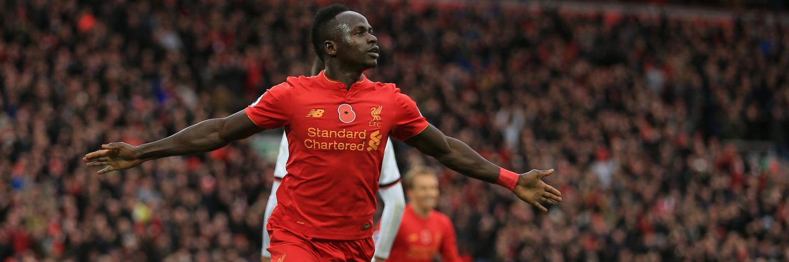 Henderson hails Liverpool’s forwards as “world-class” after going top