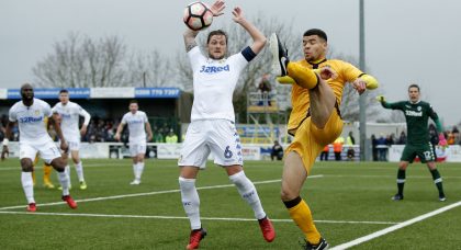 Leeds fans react as defender Liam Cooper is charged by the FA